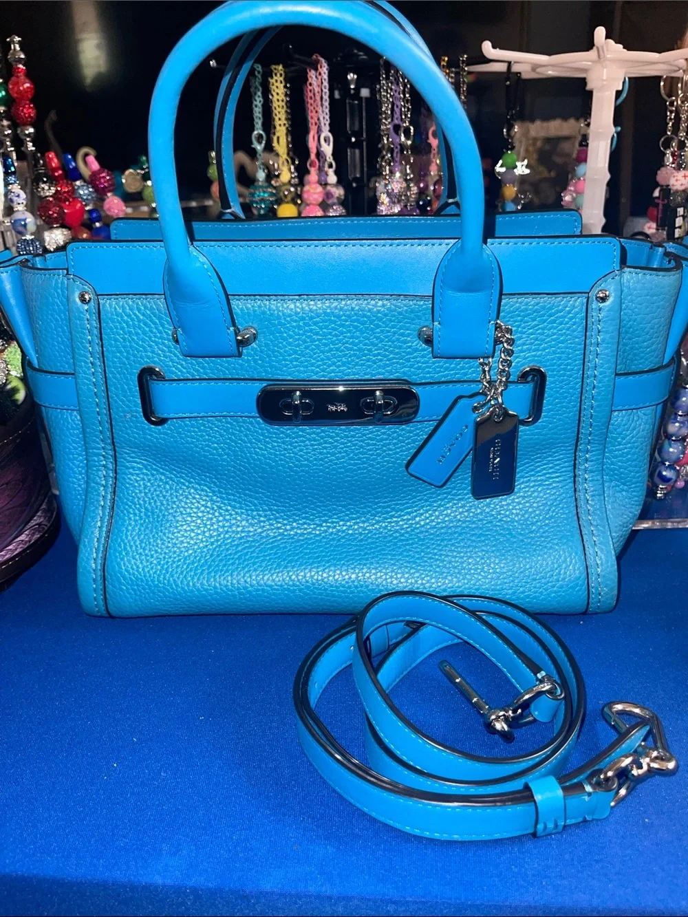 Coach Turquoise “Swagger 27”. Pebbled Leather Satchel with Silver-Tone Turnlock